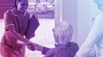 Elderly couple receiving nurse at home.