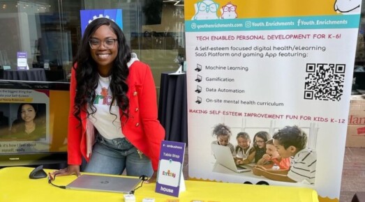 Margo Jordan at an Enrichly booth.